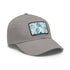 Eyes on Eyes ocean blue baseball cap with light brown patch.