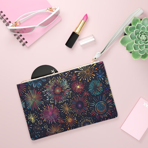 Vibrant multi-color clutch bag with festive fireworks pattern.