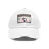 Dalmatian baseball cap with white and light brown patch.
