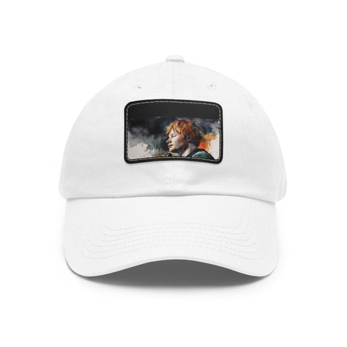 Ed Sheeran watercolor splatter baseball cap with light brown rectangle patch.