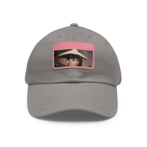 Audrey Hepburn monochrome baseball cap with white rectangular patch.