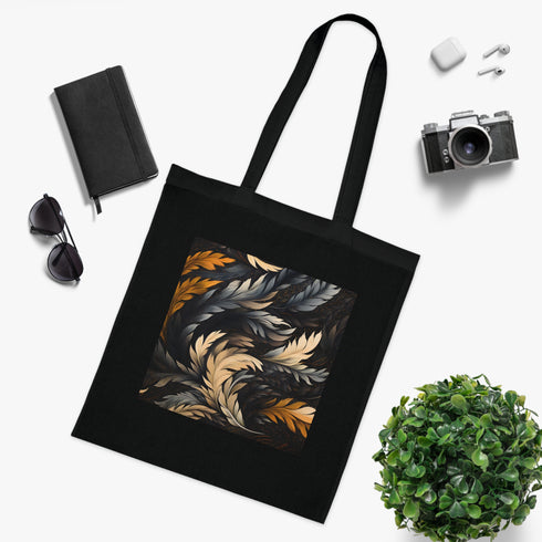 Artistic black cotton tote bag with dynamic calligraphy strokes pattern.