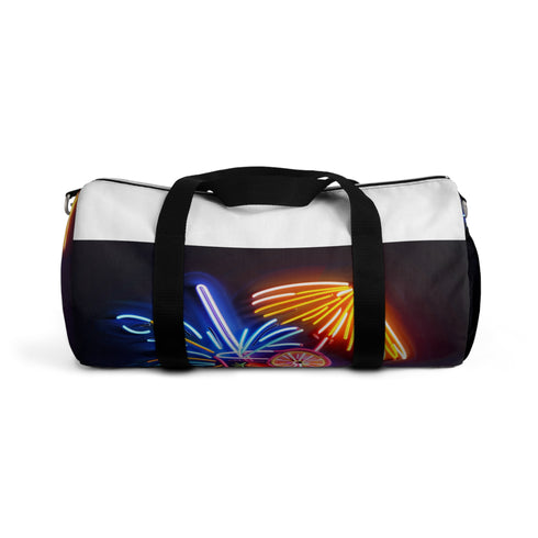 Neon cocktail duffel bag with tropical print, perfect for travel.
