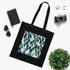 Stylish black cotton tote bag with fern leaf pattern.