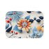 Vibrant floral bath mat with botanical blossoms for stylish bathroom.