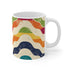 Colorful bright waves ceramic coffee mug with retro seamless pattern.