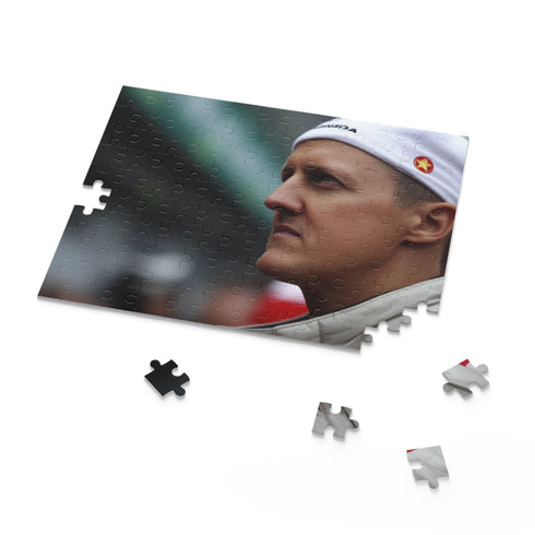 Michael Schumacher jigsaw puzzle depicting career highlights of Formula 1 champion.