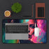 Bright neon watercolor desk mat with Charlize Theron design.