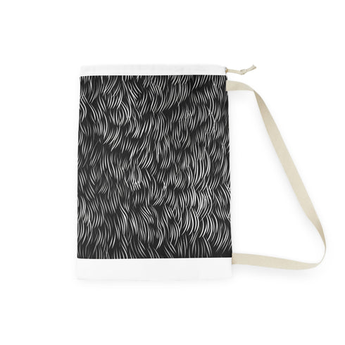 Stylish calligraphy strokes patterned laundry bag with durable textura quadrata fabric.