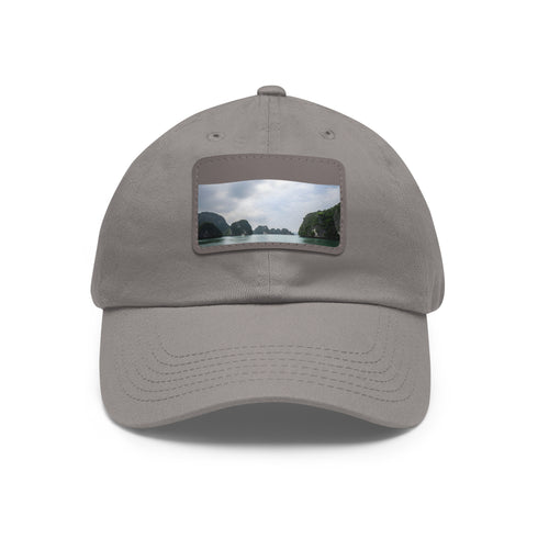 Halong Bay emerald waters baseball cap, white with light brown patch.