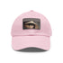 Iconic Audrey Hepburn monochrome baseball cap with light brown patch.