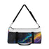 Neon space galaxy duffel bag with vibrant eye-catching design.