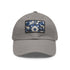 Midnight cerulean cotton baseball cap with rectangular light brown patch.