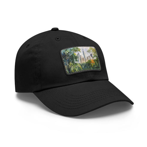 Central Park skyline watercolor baseball cap in white with light brown patch.