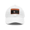 White baseball cap with light brown patch, rectangle shape. Vegan cotton.