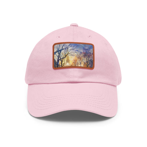 Eiffel Tower watercolor baseball cap with light brown rectangle patch.