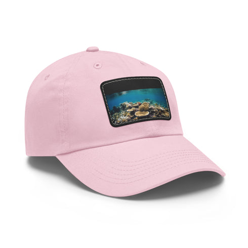 Great Barrier Reef themed white baseball cap with light brown patch.