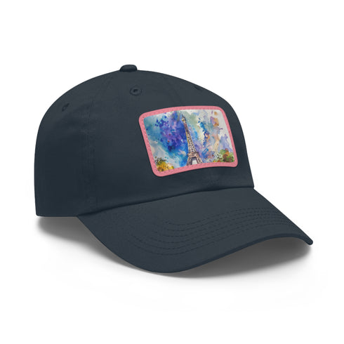 Eiffel Tower watercolor baseball cap in white with light brown patch.