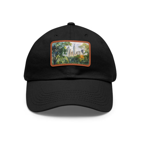 Central Park watercolor skyline baseball cap, white with light brown patch.