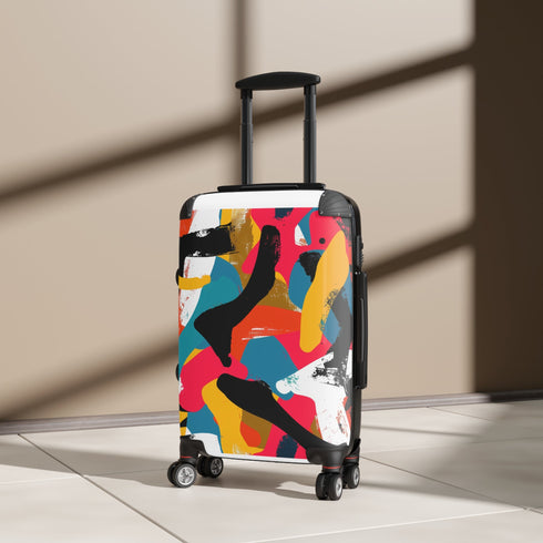 Abstract bold bright geometric suitcase set in vibrant colors for travel.