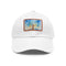 Watercolor Empire State skyline baseball cap in white with light brown patch.