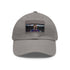 White baseball cap with Lionel Messi logo embroidered in light brown.