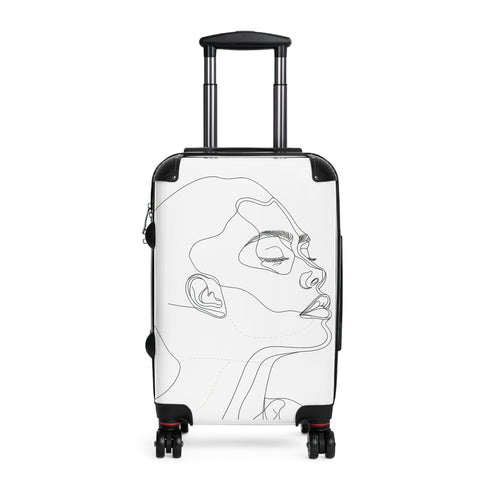 Chic black minimalist face suitcase for travel accessories.