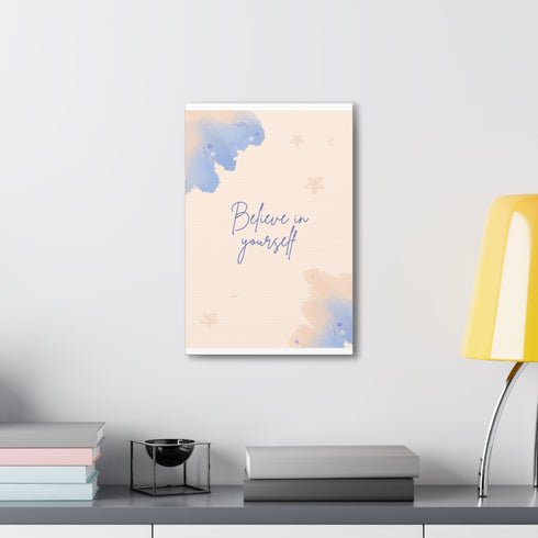 Watercolor motivational quote canvas: Believe, Achieve, Thrive in cream and blue.
