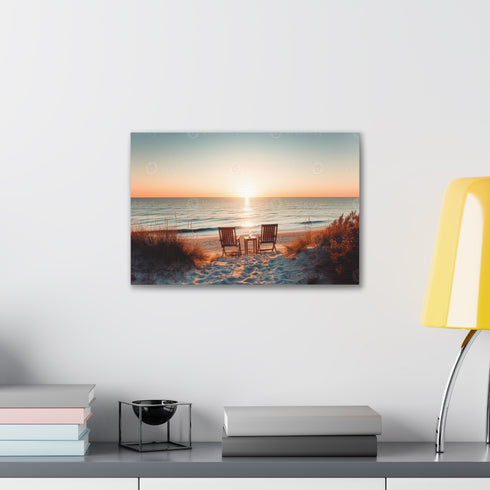 Canvas print of chairs facing sunset on tranquil beach.