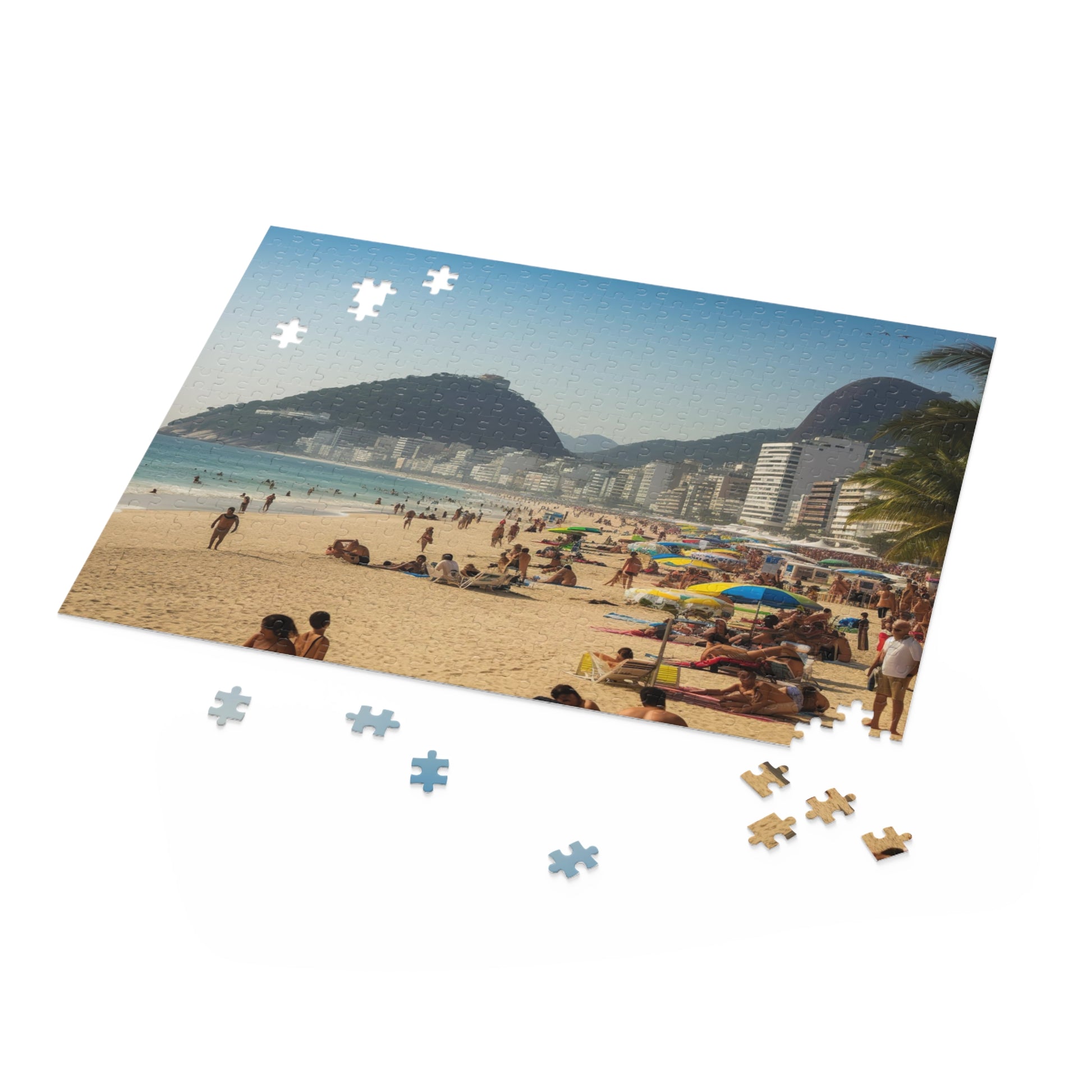 Discover the vibrant Rio Beach Jigsaw Puzzle featuring Sugarloaf Mountain, perfect for puzzle lovers.