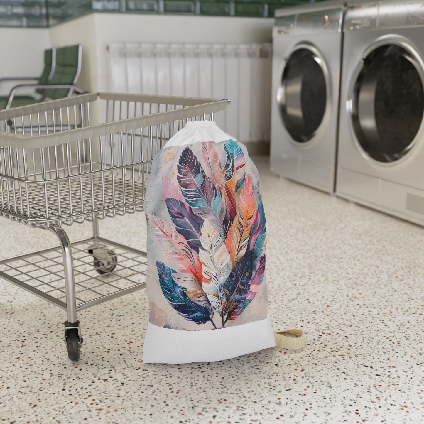 "Boho feather laundry bag - stylish and functional design for a whimsical touch in your laundry room"