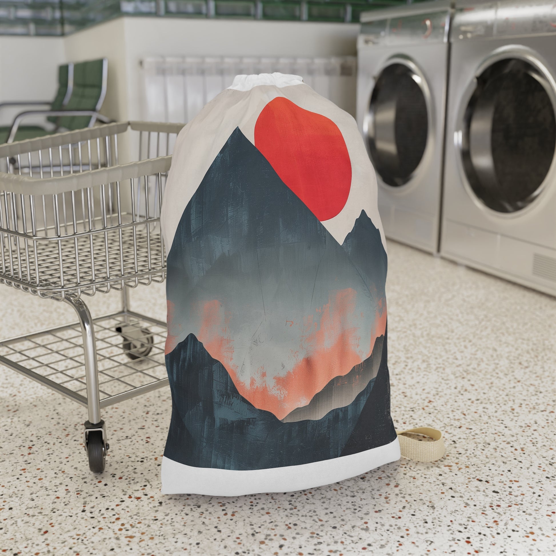 "Sunrise Mountain Laundry Bag - Stylish mountain range design for organized laundry routine"