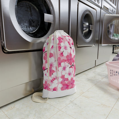 "Cherry Blossom Laundry Bag - Stylish pink and white patterned pillowcase for elegant laundry routine"