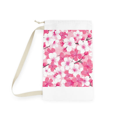 "Cherry Blossom Laundry Bag - Pink and white floral patterned bag for stylish laundry."