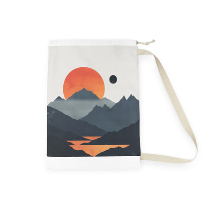 "Mountain sunrise laundry bag with serene design for organized transport"