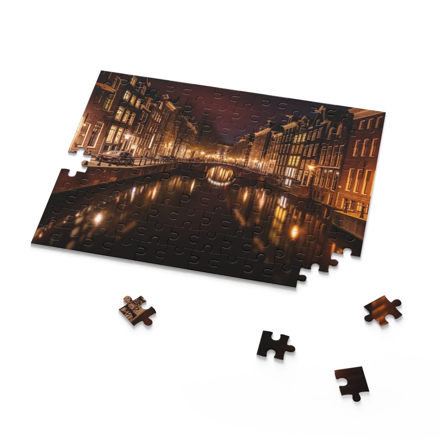 Amsterdam Canals Night Puzzle - Captivating cityscape jigsaw puzzle portraying the iconic canals of Amsterdam at night, perfect for puzzle lovers.