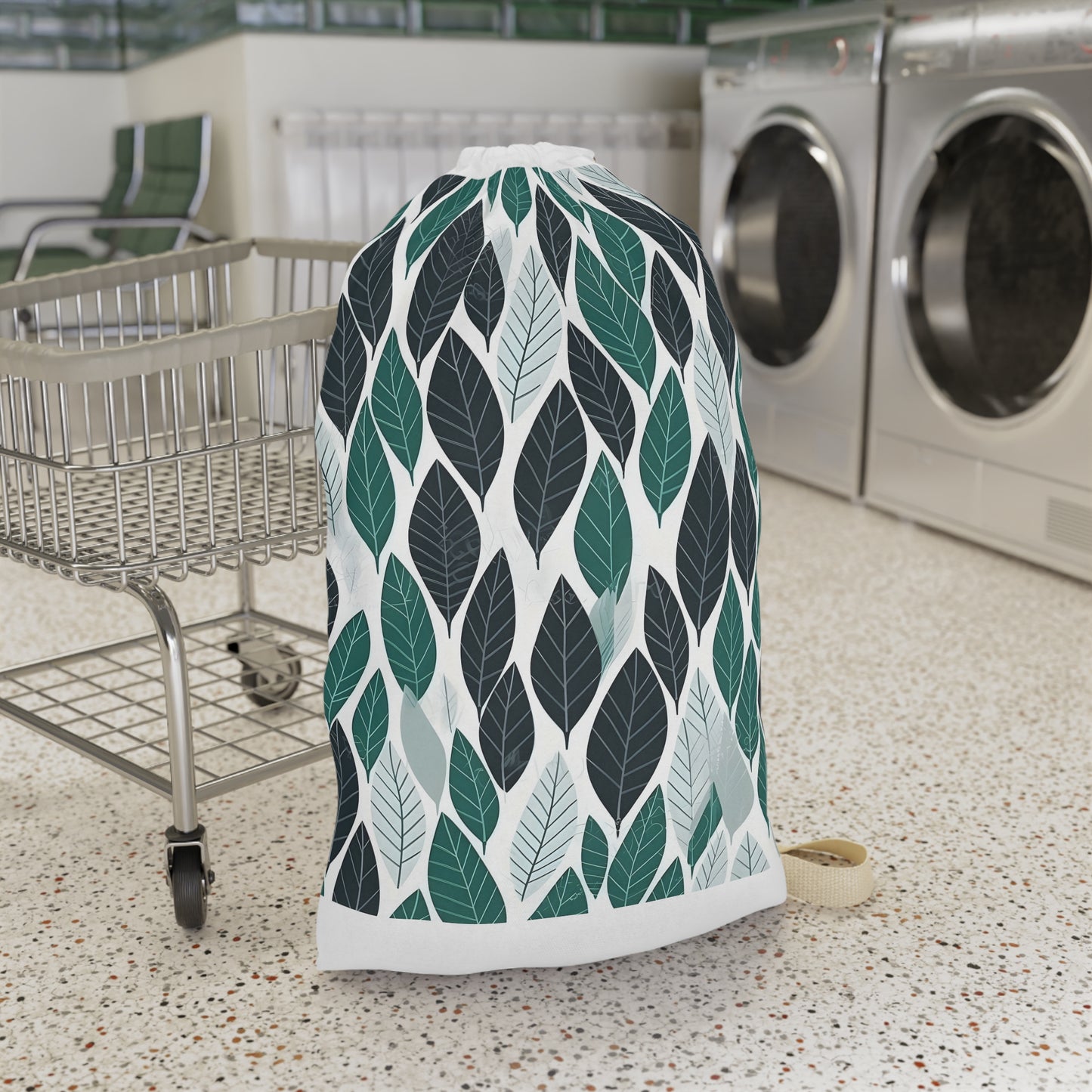 Green leaf pattern laundry bag with durable ferret texture - stylish and practical organization for laundry.