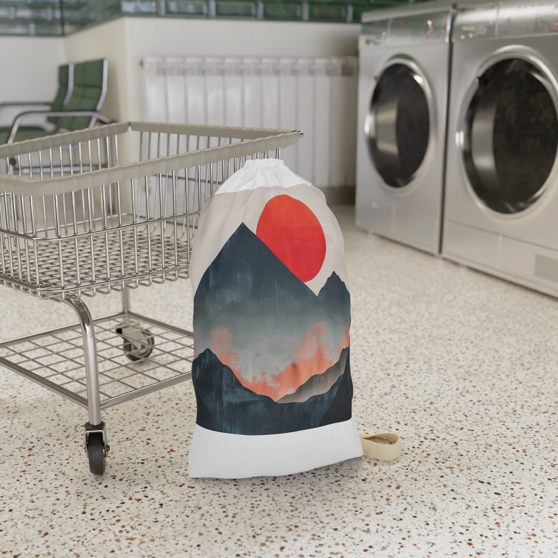 "Sunrise Mountain Laundry Bag - Stylish minimalist design for organized laundry routine"