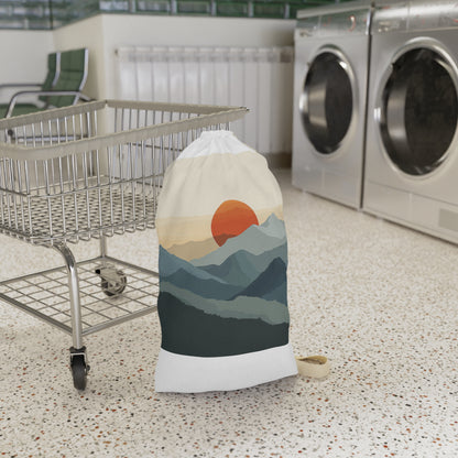 "Sunrise Mountain Laundry Bag - Stylish minimalist design with rising sun motif, perfect for organized laundry"