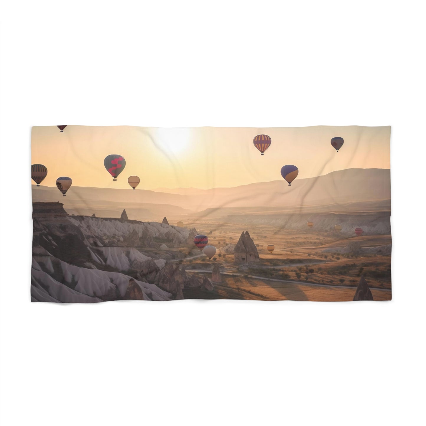 Explore the enchanting landscapes of Cappadocia with our 'Green Tour Cappadocia' Air Balloons Beach Towel. Perfect for beach lovers and adventure seekers alike