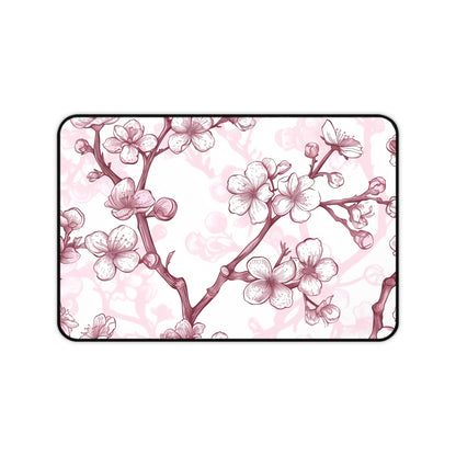 "Cherry Blossom Desk Mat: Elegant pink and white pattern for stylish workspace décor"