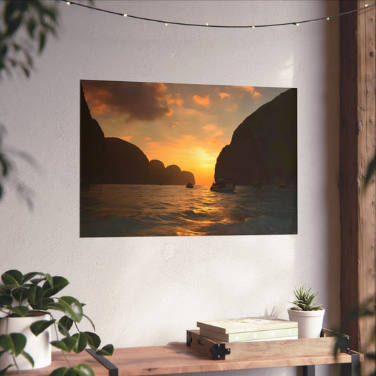 casting a warm golden glow over the waters and limestone cliffs. Transport yourself to this tropical paradise with our high-quality poster