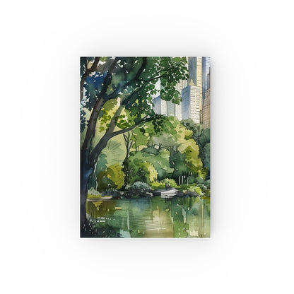 "Central Park Wanderings Journal: Watercolor cover capturing iconic landmarks and lush greenery, perfect for documenting strolls and nature's beauty. High-quality, versatile, and stylish. Makes a great gift!"