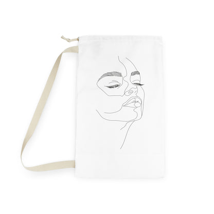 "Minimalist abstract face laundry bag for stylish and organized modern home decor"