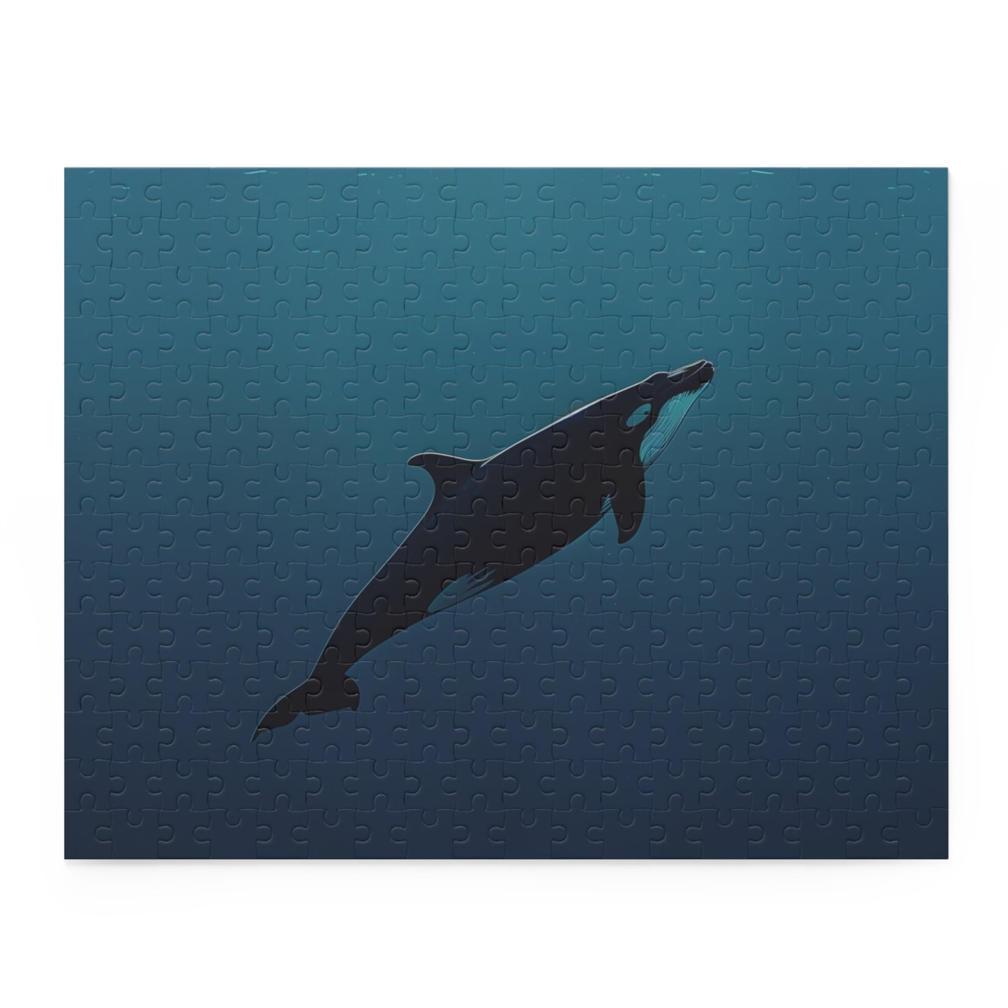 "Tranquil Ocean Whale Jigsaw Puzzle - Majestic whale swimming in serene ocean depths"