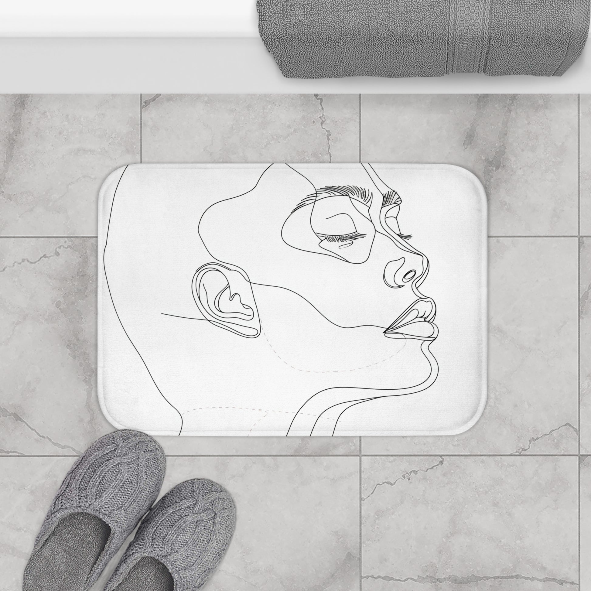 Alt text: High-quality abstract face bath mat in minimalist chic design, perfect for adding modern art to your bathroom decor. Width: 24 inches, Height: 17 inches. Comfortable, stylish, and suitable for all seasons. Makes a great gift. Visit our shop for more unique designs. Copyright 2023 - BenCPrints.