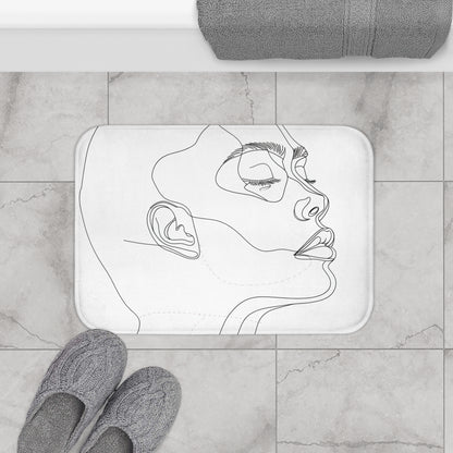 Alt text: High-quality abstract face bath mat in minimalist chic design, perfect for adding modern art to your bathroom decor. Width: 24 inches, Height: 17 inches. Comfortable, stylish, and suitable for all seasons. Makes a great gift. Visit our shop for more unique designs. Copyright 2023 - BenCPrints.