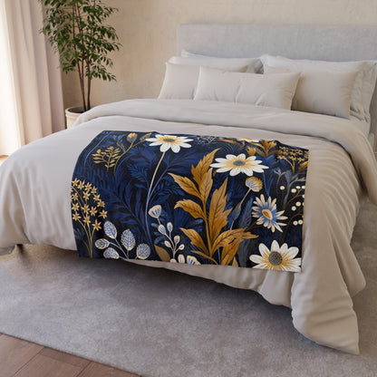 this blanket features a beautiful array of wildflowers in vibrant colors. The intricate design captures the carefree and inviting atmosphere of a sun-drenched meadow