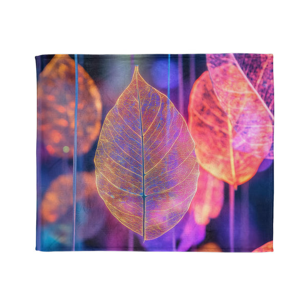 Dreamscape with Levitating Neon Leaves — Plush Fleece Throw Blanket — Draped Over Sofa & Bed Lifestyle View