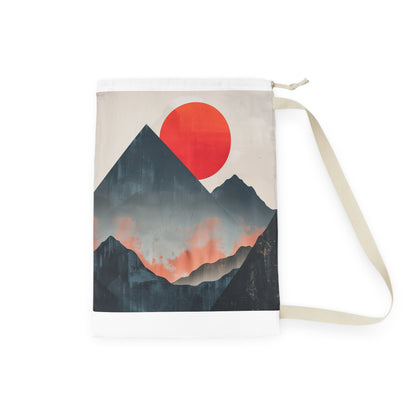 "Sunrise Mountain Laundry Bag - Minimalist design with rising sun, stylish and convenient laundry storage"